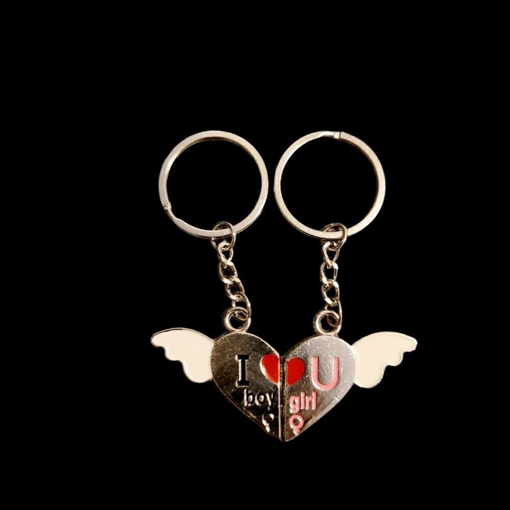2/$20 brand new silver couple keychains